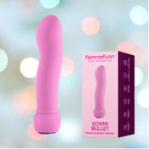 A pink "FemmeFunn Sormi Bullet" vibrator featuring a curved design and crafted from SOFTFEEL silicone is displayed alongside its packaging. The box prominently displays the product name and highlights features like flickering motion on the side. The background showcases a blurred, soft gradient with circular lights.